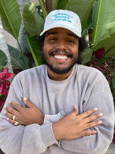 Load image into Gallery viewer, Somehow Heartbreak Feels Good In A Place Like This Hat