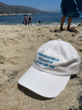 Load image into Gallery viewer, Somehow Heartbreak Feels Good In A Place Like This Hat
