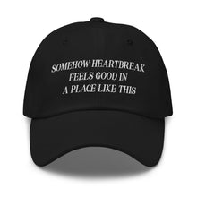 Load image into Gallery viewer, Somehow Heartbreak Feels Good In A Place Like This Hat
